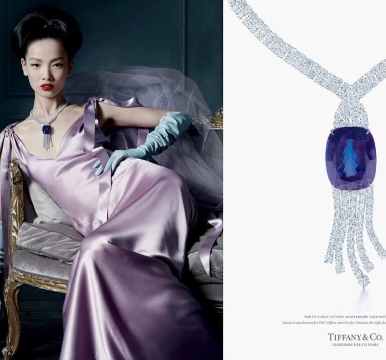 a lady in purple dress with diamond necklaces