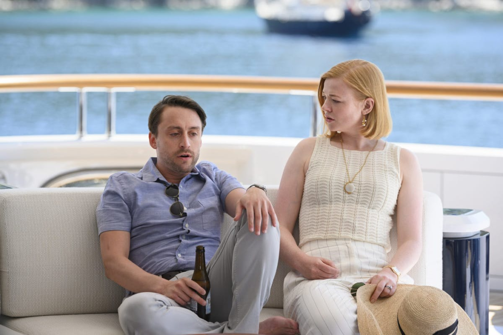 Roman and Shiv talking on a Yacht in the Adriatic