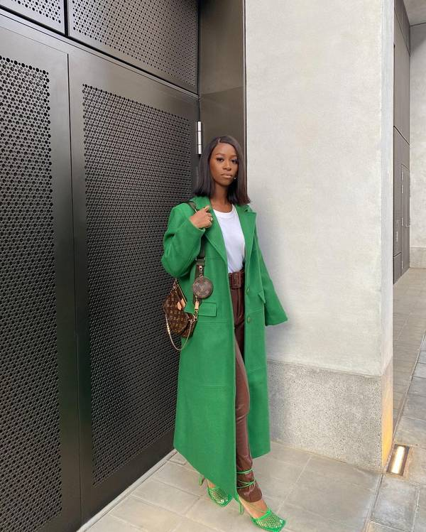 A kelly green coat makes a statement