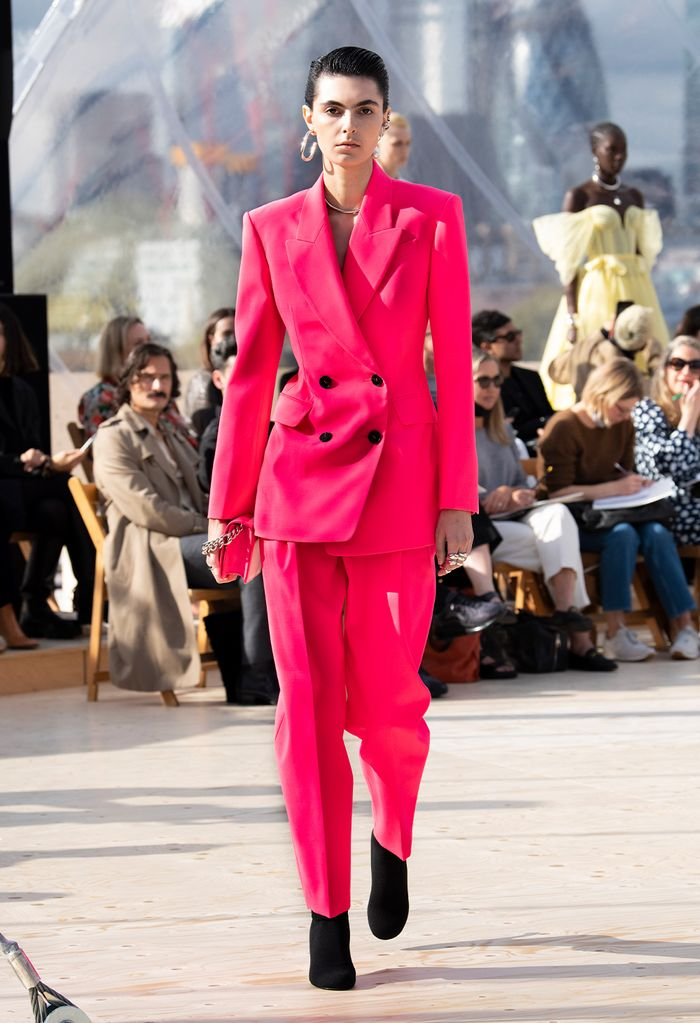 Hot pink suit that is impossible to ignore