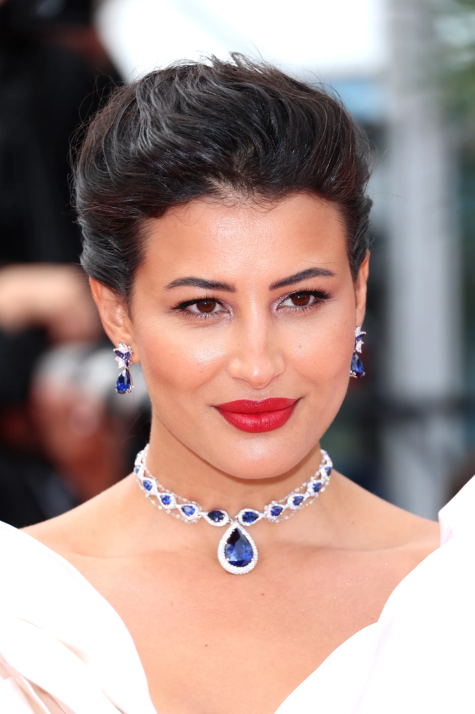 Rym Saidi, wearing a Sapphire necklace with a brilliant centre stone
