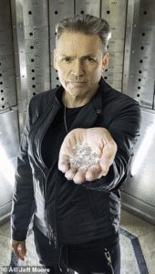diamonds in the hand of a man 